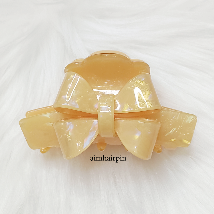 กิ๊บหนีบผมทรงโบว์สีส้ม - aimhairpin จำหน่ายกิ๊บติดผมเกาหลีแท้ และเครื่องประดับ ยางรัดผม คาดผมแฟชั่น สร้อยคอ ต่างหู