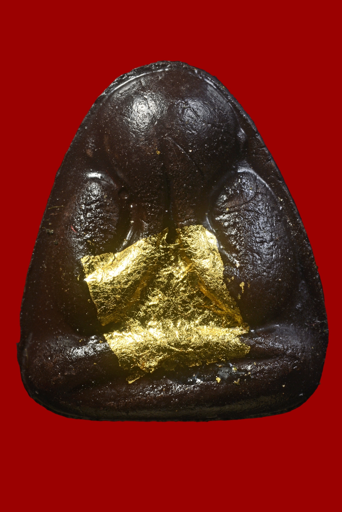 พระปิดตาหลวงพ่อแก้ววัดเครือวัลย์ (วัดสร้างปี พ.ศ.2538 ) ***เนื้อผงคลุกรัก ปิดแผ่นทอง***