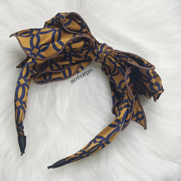 คาดผมแบบไม่หักสีน้ำตาล ตัวโบว์ดัดได้ - aimhairpin จำหน่ายกิ๊บติดผมเกาหลีแท้ และเครื่องประดับ ยางรัดผม คาดผมแฟชั่น สร้อยคอ ต่างหู