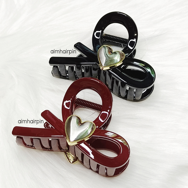 กิ๊บหนีบผมทรงโบว์สไตล์เกาหลี แต่งอะไหล่หัวใจ สีทอง - aimhairpin จำหน่ายกิ๊บติดผมเกาหลีแท้ และเครื่องประดับ ยางรัดผม คาดผมแฟชั่น สร้อยคอ ต่างหู