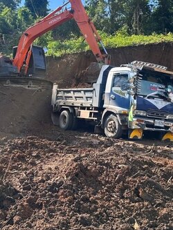 Land filling Pro Services – Expert land development, earth filling, and mountain road construction in Loei Province.