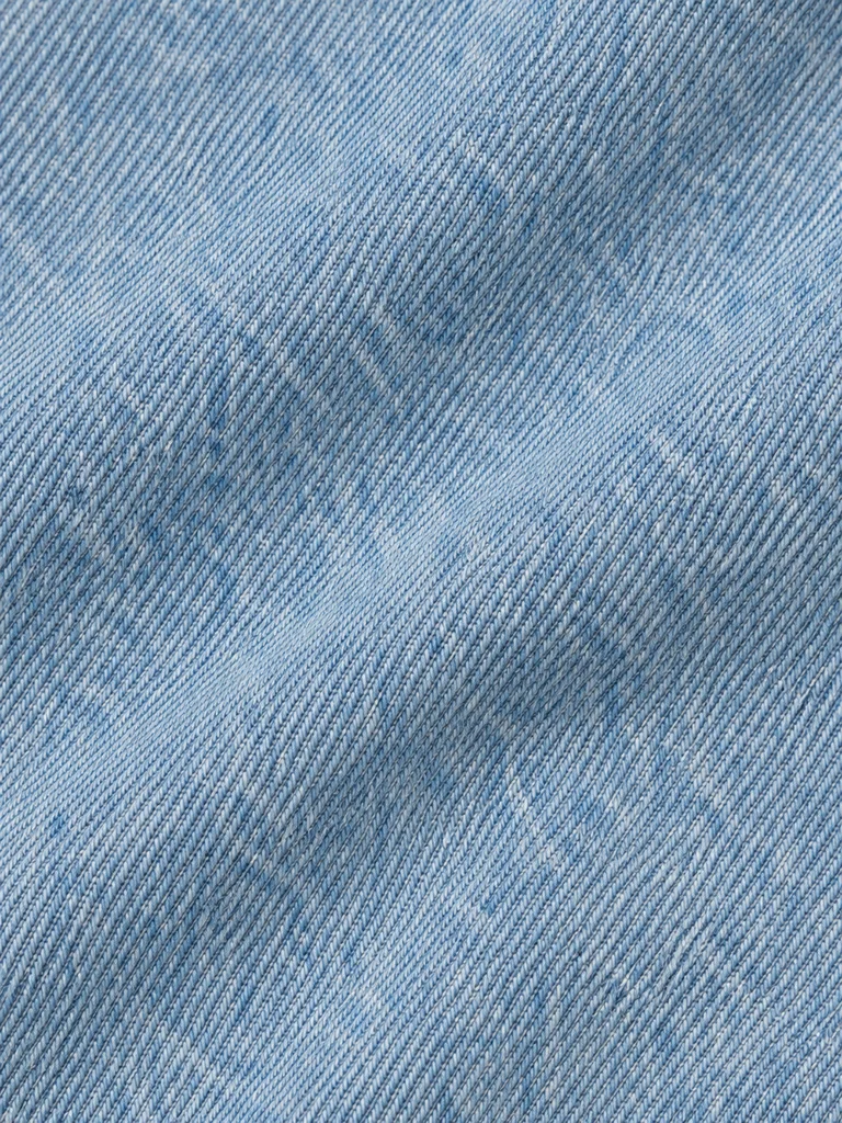 CURVED-LEG JEANS — LIGHT WASHED BLUE